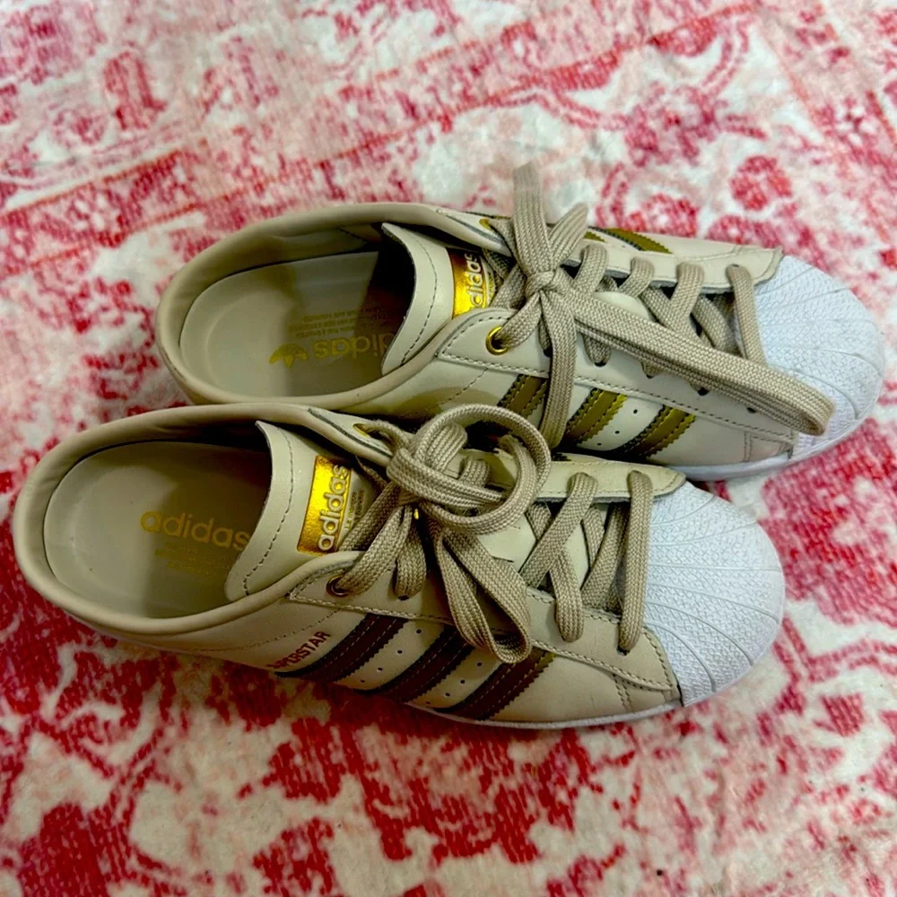 slip-on sneakers in a gorgeous brown, gold metallic and white colorway.